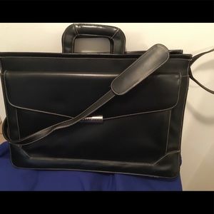 Fiorelli Briefcase holds laptop. Carry handles /shoulder strap. Leather
